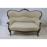 A VICTORIAN STYLE MAHOGANY CARVED TWO SEATER SOFA,