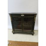 A VICTORIAN EBONISED AND BRASS INLAID SIDE CABINET,