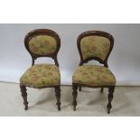 A SET OF EIGHT BALLOON BACK MAHOGANY DINING ROOM CHAIRS,