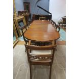 A FINE REGENCY STYLE MAHOGANY ELEVEN PIECE DINING SUITE, comprising ten chairs,