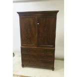 A GOOD GEORGIAN MAHOGANY LINEN PRESS ON CHEST,