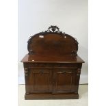 A MAHOGANY CARVED CHIFFONIER,