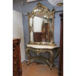 A CONTINENTAL CARVED GILTWOOD CONSOLE TABLE AND MIRROR,