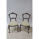 A SET OF SIX VICTORIAN MAHOGANY CARVED DINING ROOM CHAIRS,