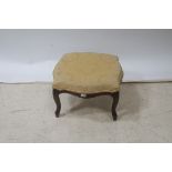 AN CONTINENTAL MAHOGANY AND UPHOLSTERED STOOL,