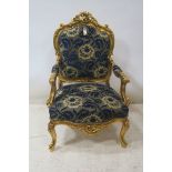 A PAIR OF CARVED GILTWOOD ARMCHAIRS, in Louis Seize style, of large proportions,