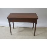 A VICTORIAN MAHOGANY FOLDOVER TOP TABLE,