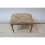 A FRENCH CREAM PAINTED AND CARVED WOOD FOOTSTOOL,