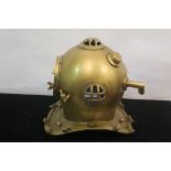 A BRASS FRAMED DIVER'S HELMET,