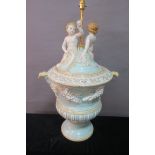 A PAINTED PORCELAIN TABLE LAMP, of large proportions,