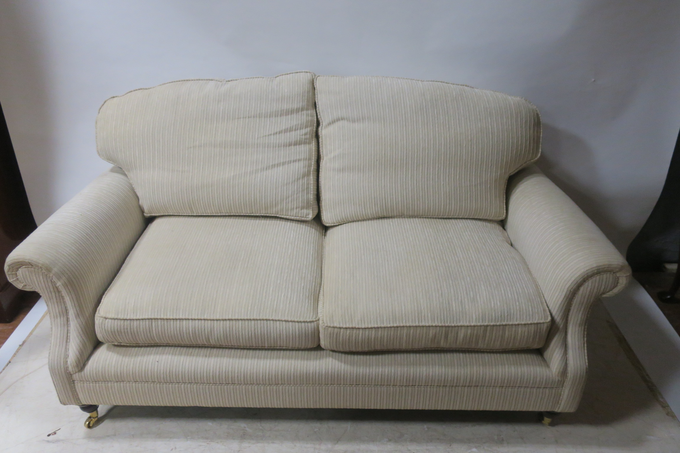 A CONTEMPORARY TWO SEATER SOFA,