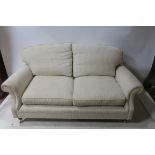 A CONTEMPORARY TWO SEATER SOFA,