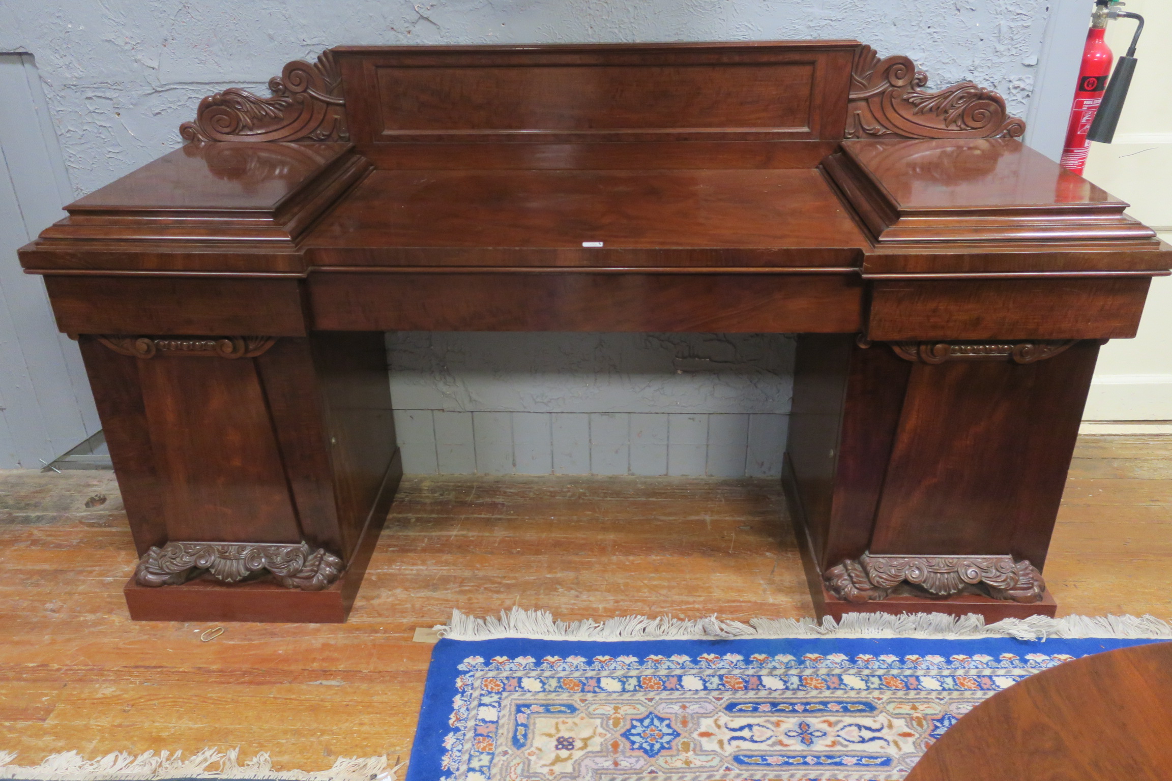 A FINE REGENCY MAHOGANY PEDESTAL SIDEBOARD,