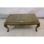 A CONTINENTAL STYLE CARVED GILTWOOD COFFEE TABLE,