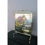 A BRASS FRAMED FIRE SCREEN,