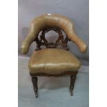 A FINE MAHOGANY CARVED BROWN LEATHER UPHOLSTERED LIBRARY CHAIR,