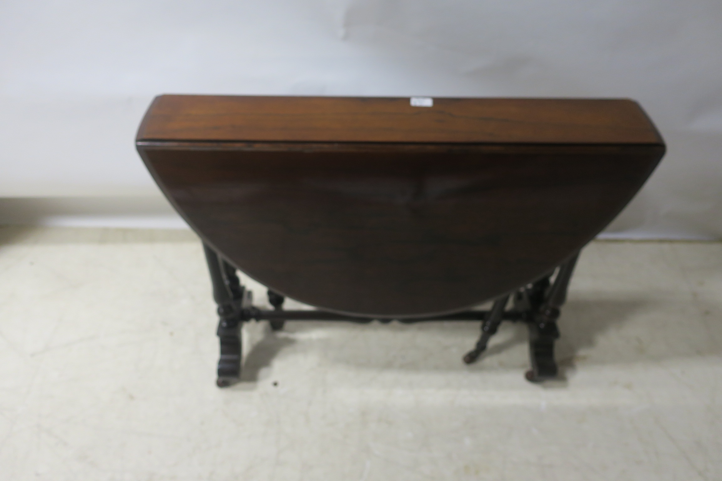 A VICTORIAN ROSEWOOD SUTHERLAND TABLE,