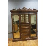 A LATE 19th CENTURY MAHOGANY AND WALNUT VENEERED WARDROBE, bearing label for A.