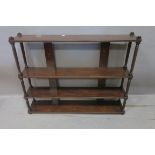 A 19th CENTURY MAHOGANY FRAME WALL MOUNTED BOOK SHELF,