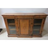 A WALNUT AND MARQUETRY INLAID BREAKFRONT SIDE CABINET,