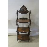 A VICTORIAN MAHOGANY WHATNOT,