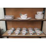 A ROYAL ALBERT BONE CHINA TEASET, in Jacobean style,