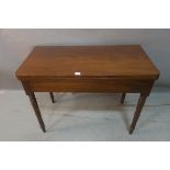 A VICTORIAN MAHOGANY FOLDOVER TOP TABLE,