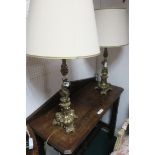 A PAIR OF GILT METAL FIGURAL TABLE LAMPS,