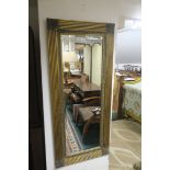 A CONTINENTAL GILTWOOD AND GESSO MIRROR,