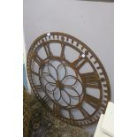 A METAL CLOCK TOWER WALL CLOCK FACE