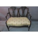 A NEO CLASSICAL STYLE TWO SEATER SOFA,