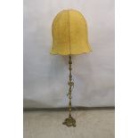 A CONTEMPORARY LAMP STANDARD,