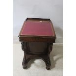 A FINE VICTORIAN ROSEWOOD DAVENPORT, the tooled, leather hinged writing slope,