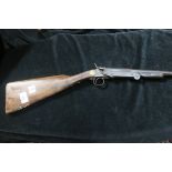 A DECOMMISSIONED SINGLE BARREL 410 SHOTGUN,