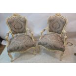 A PAIR OF CONTINENTAL CREAM PAINTED AND UPHOLSTERED ARMCHAIRS,