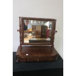 A GEORGIAN MAHOGANY CRUTCH MIRROR,