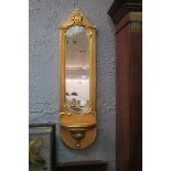 A PAIR OF CONTINENTAL GILT FRAMED MIRRORS,