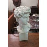 A WHITE COMPOSITION BUST,