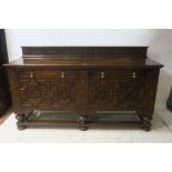 A FINE MAHOGANY CARVED SIDEBOARD, in the style of Pugin,
