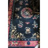 A CHINESE WOOL RUG,