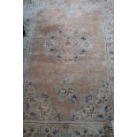 A CHINESE SILK WOOL RUG,