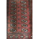 A BOKHARA WOOL RUNNER,