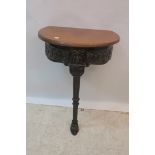 A METAL AND MAHOGANY CONSOLE TABLE,