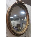 A CONTINENTAL GILT FRAME MIRROR,