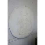 A PLASTER WALL PLAQUE,