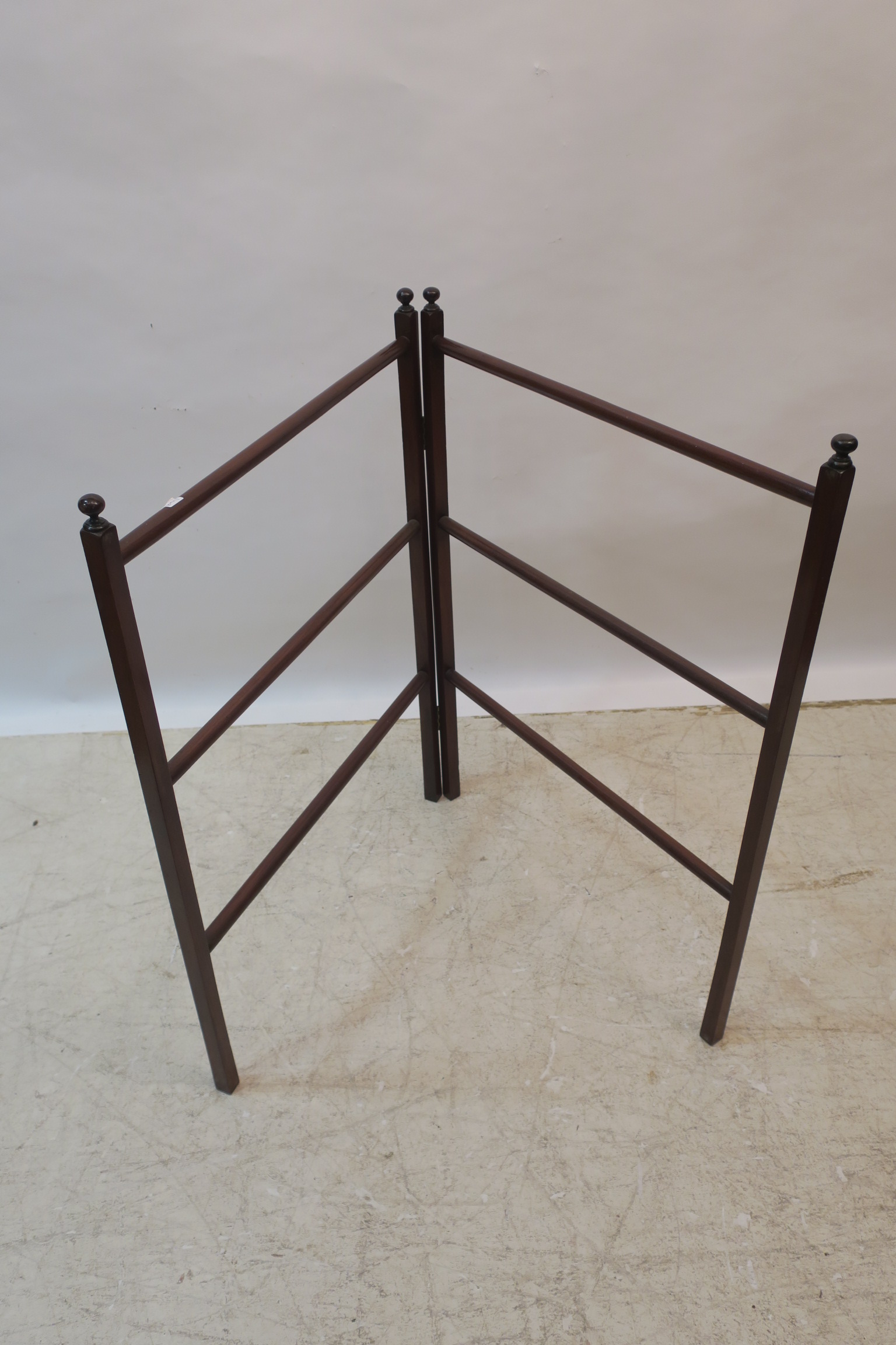 A MAHOGANY SIX BAR FOLDING TOWEL RAIL 93cm (h) x 135cm (w)