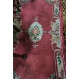 A CHINESE WOOL RUG,