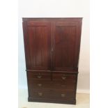 A 19th CENTURY MAHOGANY GENTLEMAN'S WARDROBE ON CHEST,