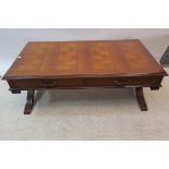 A REGENCY DESIGN MAHOGANY COFFEE TABLE,