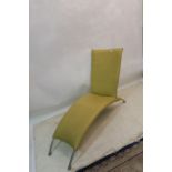 A CONTEMPORARY CHROME AND LEATHER UPHOLSTERED LOUNGER,